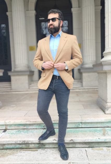 Leon Papo wearing a Zegna camel hair blazer